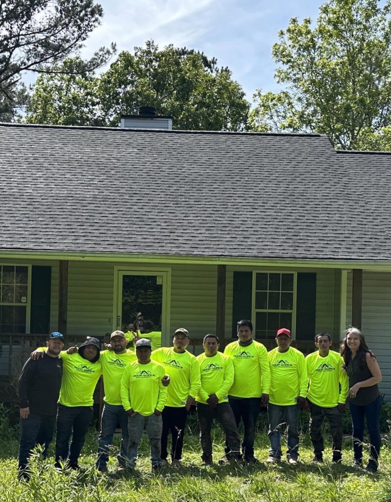The Roof Works crew in front of a completed roof replacement in NW Georgia