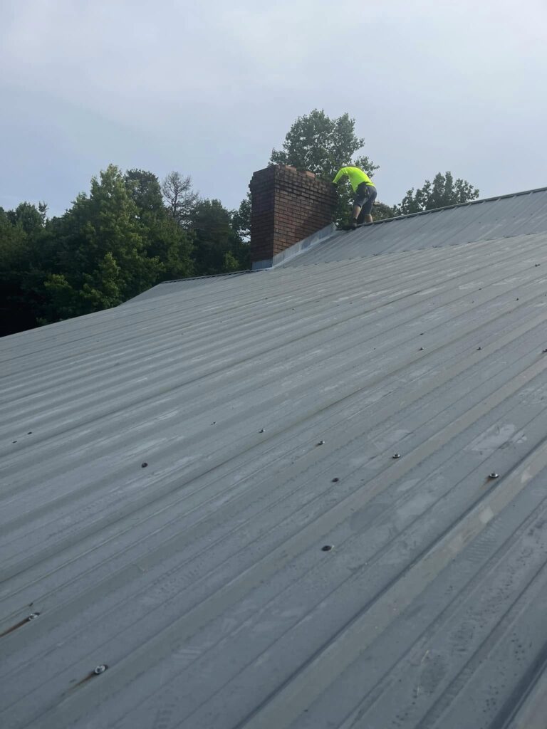 Completed standing seam metal roof on a NW Georgia property
