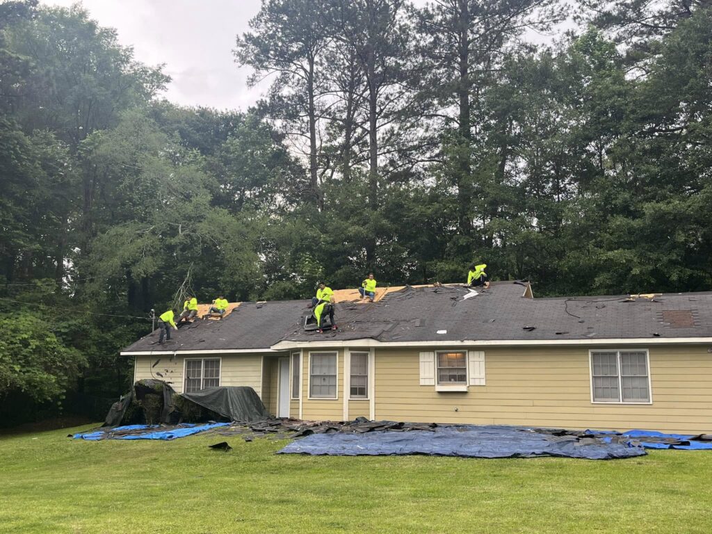 Roof Works crew tearing off an old roof in NW Georgia