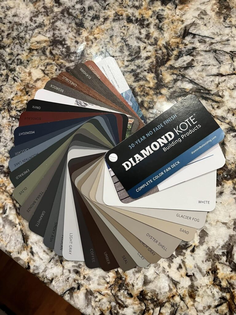 Diamond KOTE siding color samples on the manufacturer sample board