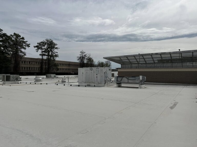 Completed commercial TPO roof on a low-slope building