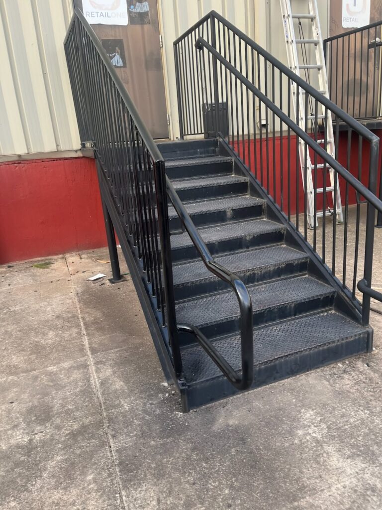 Commercial exterior staircase repaired by Roof Works