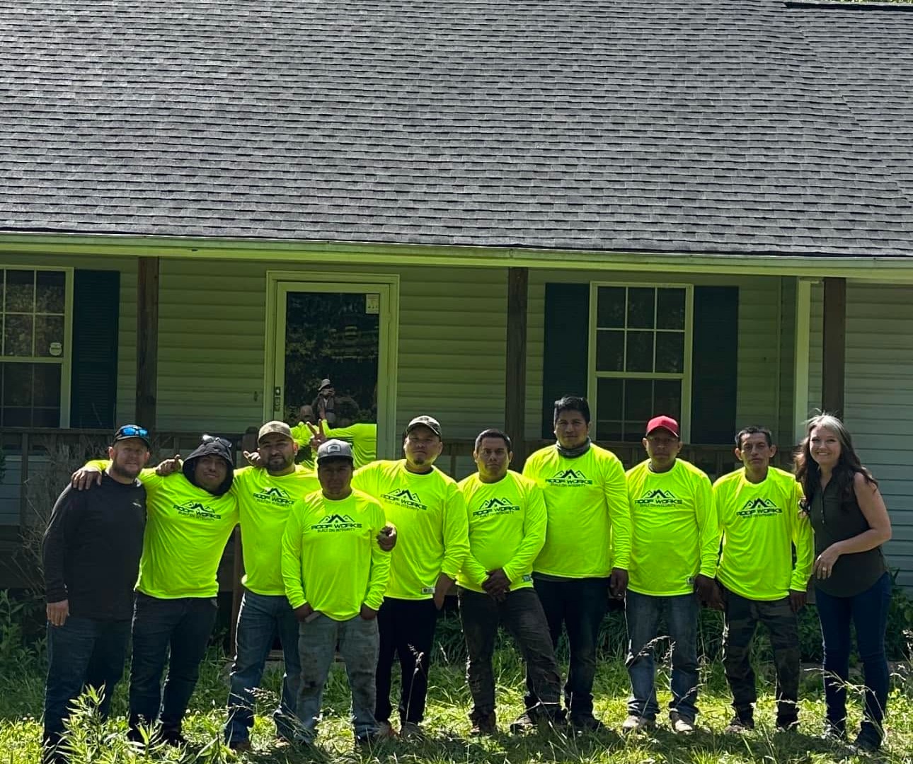 The Roof Works crew in front of a completed roof replacement in NW Georgia