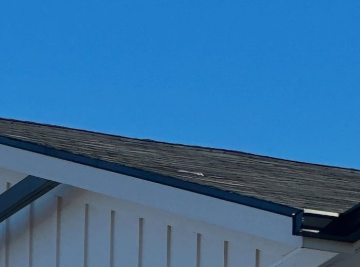 The same roof after wind damage repair by Roof Works