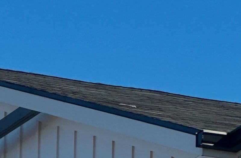 The same roof after wind damage repair by Roof Works