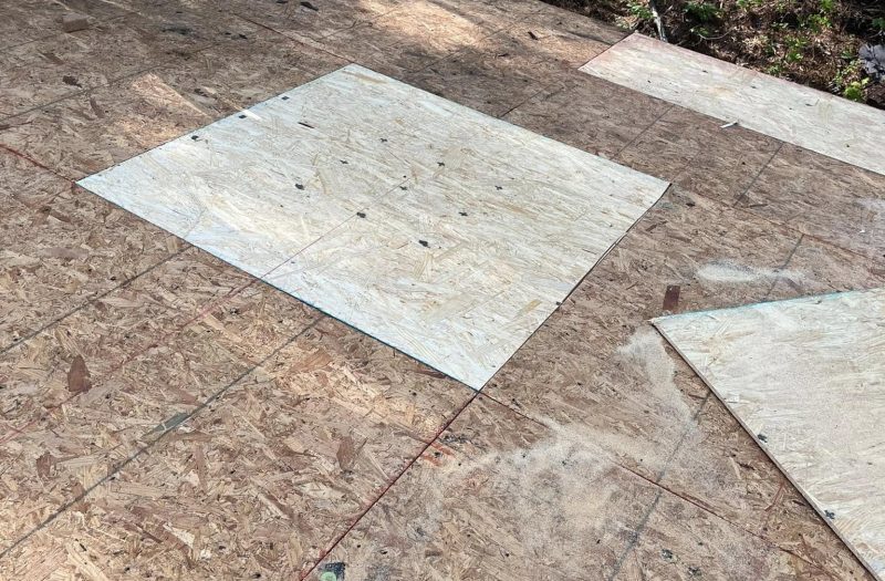 Asphalt roof replacement in progress by Roof Works