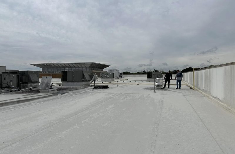 The Roof Works team on a completed commercial TPO roof