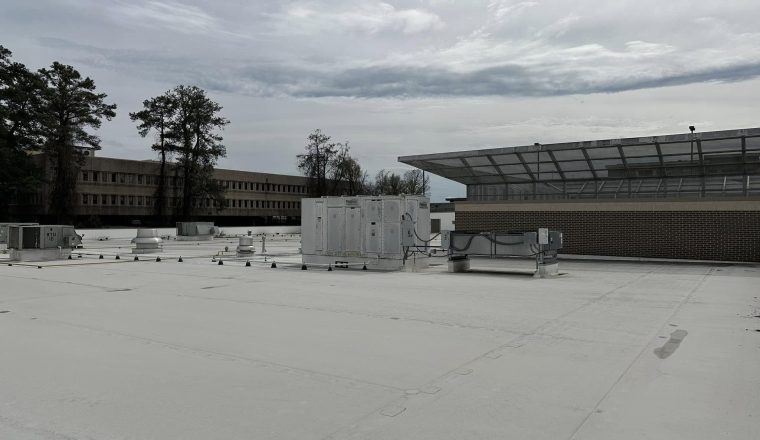 Completed commercial TPO roof on a low-slope building