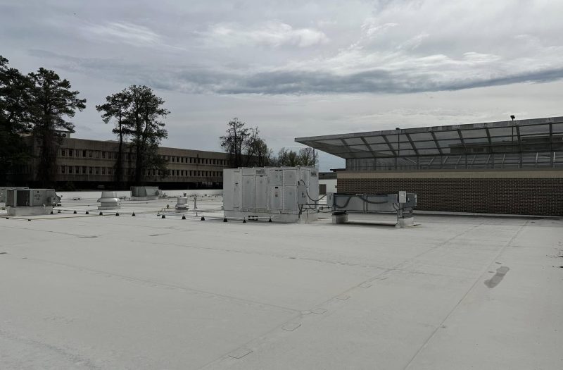 Completed commercial TPO roof on a low-slope building