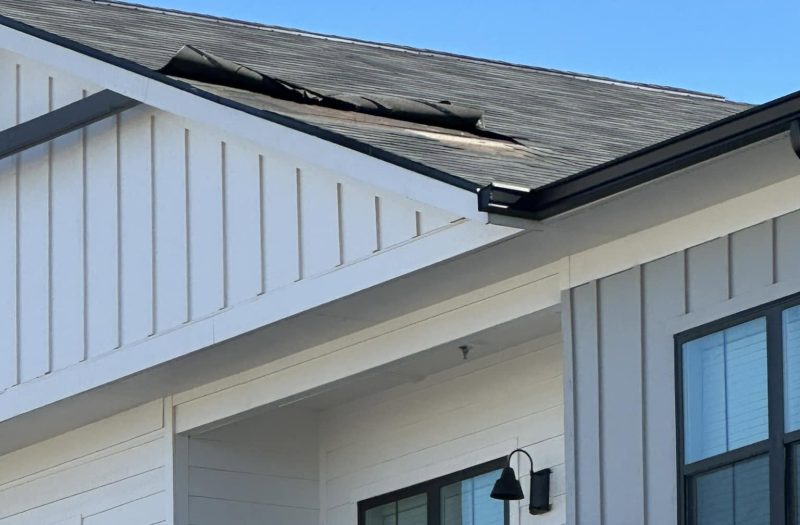 Wind damage to the roof of a NW Georgia home