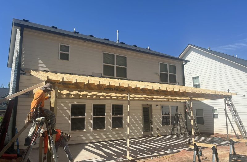 Roof Works crew framing a porch cover on a NW Georgia home