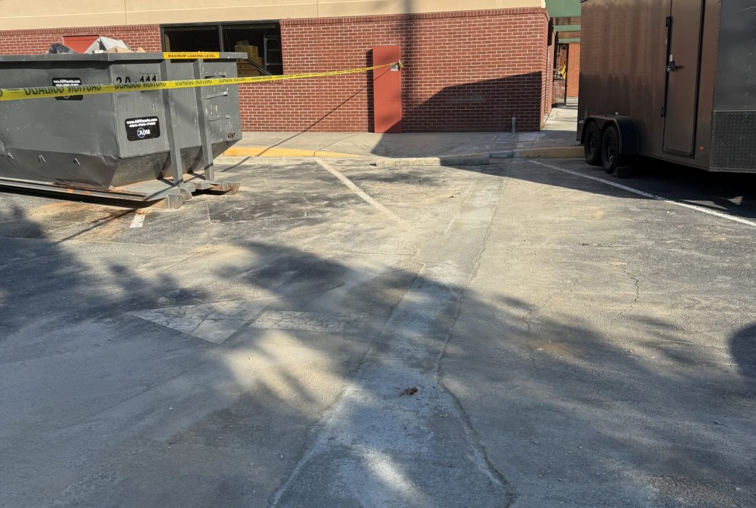 Finished concrete pour where Roof Works replaced a cut section of paving
